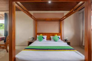 Treebo Vrindavan, 3 Km From Madikeri Fort客房内的一张或多张床位