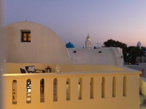 a view from the roof of a building at Blue and White Aura Santorini traditional house in Megalochori