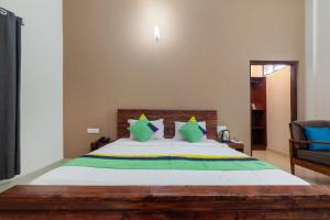 Treebo Vrindavan, 3 Km From Madikeri Fort客房内的一张或多张床位