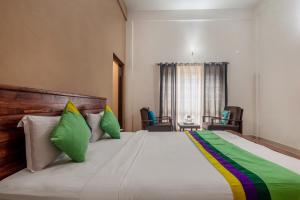 Treebo Vrindavan, 3 Km From Madikeri Fort客房内的一张或多张床位