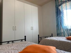 Llit o llits en una habitació de Colors Apartments
