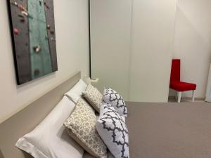 Łóżko lub łóżka w pokoju w obiekcie Rome Holiday Home