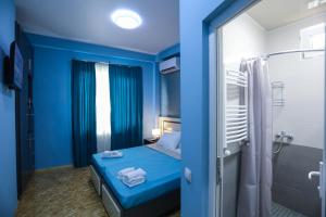 Voodi või voodid majutusasutuse Hotel Sagu toas