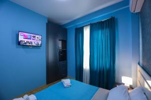 Postel nebo postele na pokoji v ubytování Hotel Sagu