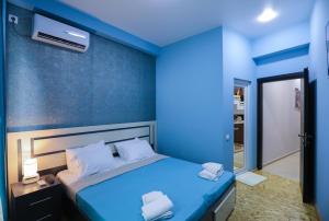 Postel nebo postele na pokoji v ubytování Hotel Sagu