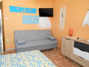 TV a/nebo společenská místnost v ubytování I Tetti Di Sassari B&B
