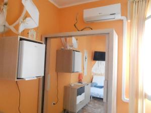 TV a/nebo společenská místnost v ubytování I Tetti Di Sassari B&B