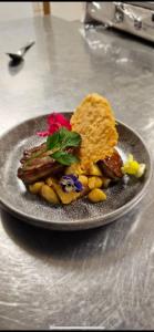 een bord eten op een tafel bij Au Coeur d'Alle by Belvilla in Alle +34 foto's