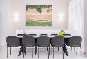 a dining room with a table and chairs at KG4 LUX Apartments in Tel Aviv