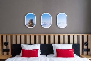 Postel nebo postele na pokoji v ubytování Tailormade Hotel BAB Bachenbülach