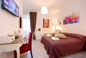 A bed or beds in a room at Sivory Rome