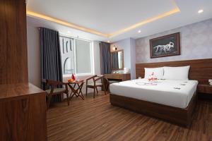 Postel nebo postele na pokoji v ubytování BIDV Beach Hotel Nha Trang
