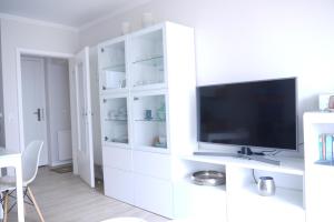 TV a/nebo společenská místnost v ubytování Meeresrauschen-Dünengold
