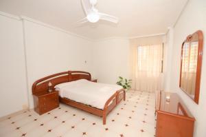 Кровать или кровати в номере Apartalux Aqua Sol