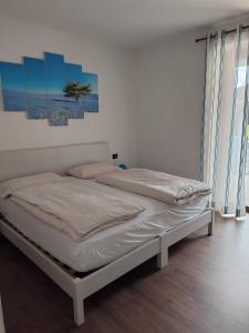 Postel nebo postele na pokoji v ubytování B&B Vivi l'Attimo + 14 fotografií