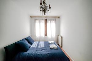 Posteľ alebo postele v izbe v ubytovaní Delightful Apartment at 5 mins from Rialto Bridge