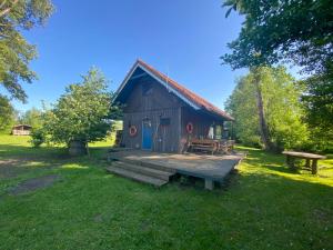 Garður fyrir utan Alksnynas