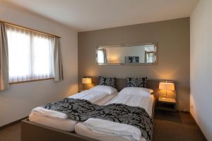 Postel nebo postele na pokoji v ubytování Hotel Allegra