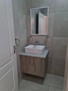 Ванна кімната в Cozy Apartment Jhb South