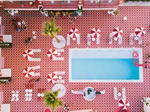 an overhead view of a swimming pool in a resort at Romeos Ibiza - Adults Only in San Antonio Bay
