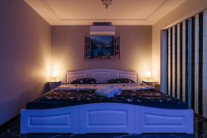A bed or beds in a room at Apartament Domek GRILL Bukowina Białka JAUCUZZI w pokoju na wyłączność
