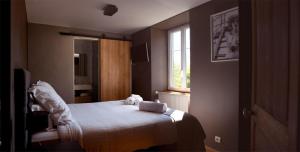 Posteľ alebo postele v izbe v ubytovaní La Bastide 1767 Villa de charme avec piscine 15x5, climatisation, 4 chambres, cuisine extérieur + 26 fotografií