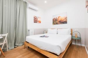 A bed or beds in a room at Trevi Fountain Apartment - ZENO 03