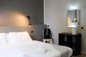 Posteľ alebo postele v izbe v ubytovaní Hp Fly Hotel Bologna