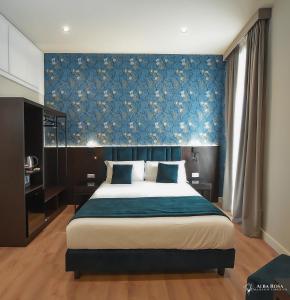 Postel nebo postele na pokoji v ubytování Alba Rosa Rooms