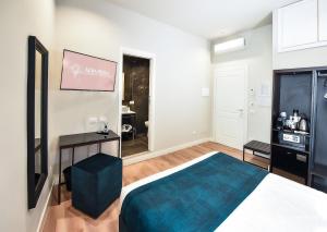 Postel nebo postele na pokoji v ubytování Alba Rosa Rooms