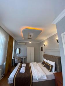 Postel nebo postele na pokoji v ubytování Berce Apartments