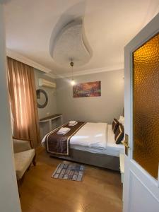 Postel nebo postele na pokoji v ubytování Berce Apartments