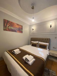 Postel nebo postele na pokoji v ubytování Berce Apartments
