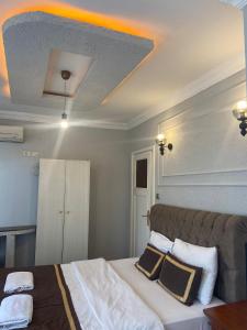 Postel nebo postele na pokoji v ubytování Berce Apartments