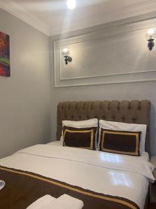 Postel nebo postele na pokoji v ubytování Berce Apartments