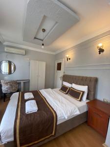 Postel nebo postele na pokoji v ubytování Berce Apartments