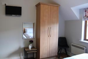 TV a/nebo společenská místnost v ubytování Cosy Holidayhomes Kerry