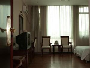 Televizorius ir (arba) pramogų centras apgyvendinimo įstaigoje Yidun Hotel Foshan Luocun