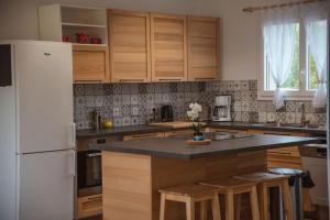 Η κουζίνα ή μικρή κουζίνα στο Maison Nouméa +10 φωτογραφίες