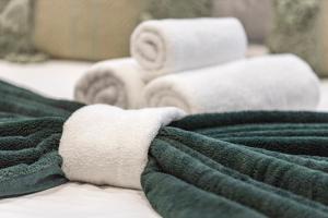 a close up of towels on a bed at Spacious Luxury Apartment King Bed - Central Location in London