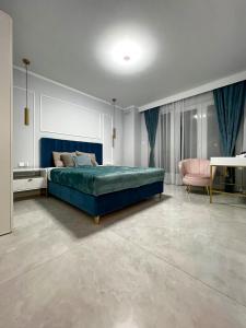 Katil atau katil-katil dalam bilik di PaVoni Apartments Veranda Blu Mare