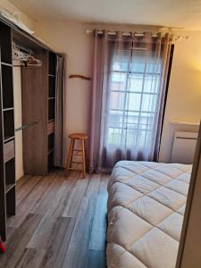 Posteľ alebo postele v izbe v ubytovaní Maisonnette du bonheur