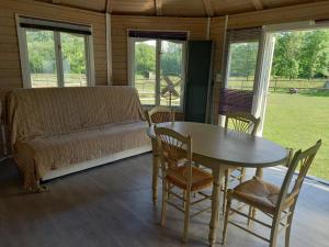 Χώρος καθιστικού στο Chalet au cœur de la nature