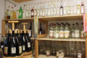 a bunch of bottles of wine on shelves at Haus Johanna in Radstadt +48 photos