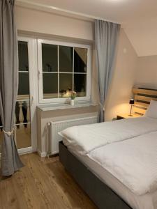 Letto o letti in una camera di GREEN ViEW APARTMENTS