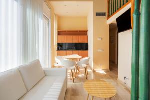 A seating area at MAREA Hotel