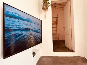TV a/nebo společenská místnost v ubytování Paraíso do Corval