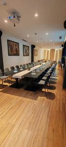 a large conference room with a long table and chairs at Aparthotel Zlatni Javor in Jahorina