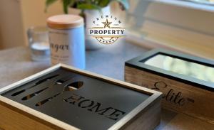 a wooden box sitting on top of a table at THE LOFT with private parking, BBQ area, near COMO lake I Villa dei Leoni in Morbio Inferiore