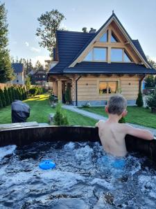 Bazén v ubytovaní Nosalowski Wypas Jacuzzi & Sauna alebo v jeho blízkosti